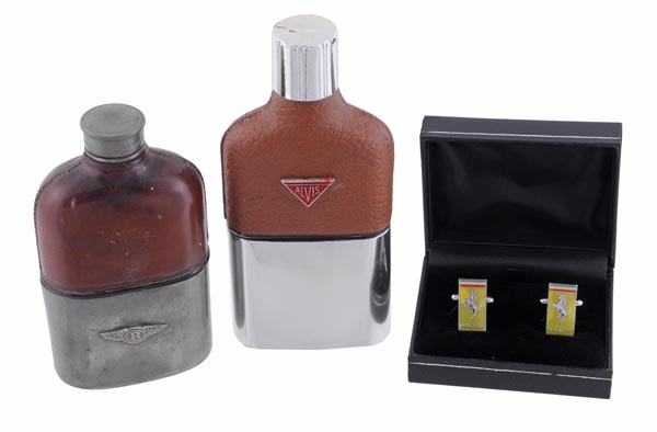 [Alvis/Bentley and Ferrari] - A stainless steel and leather covered brandy flask, applied with an