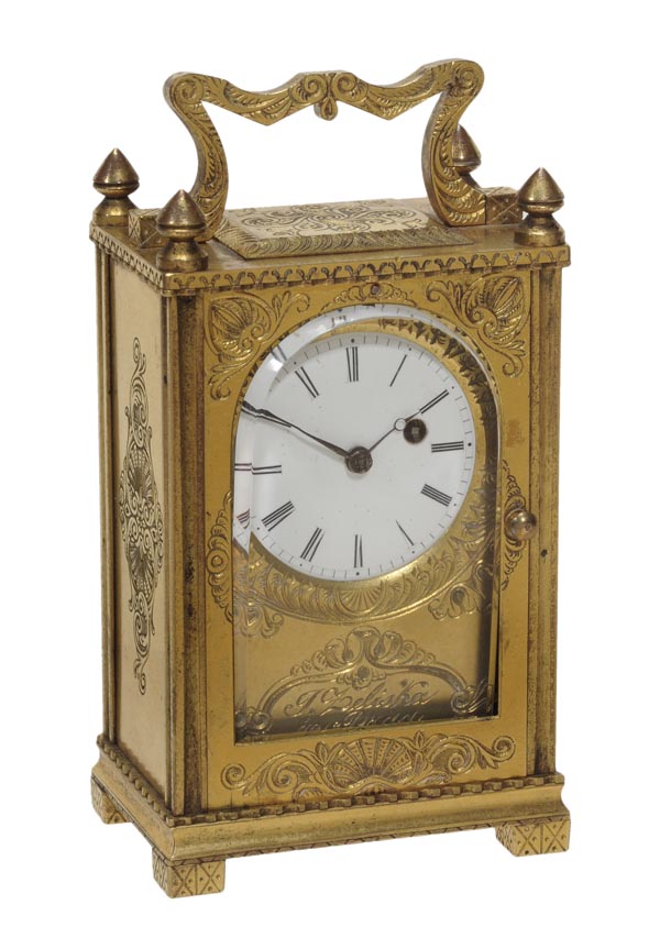 A Czechoslovakian engraved gilt brass miniature carriage timepiece incorporating earlier French