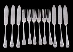 A set of six silver fish forks and knives by Harrison Fisher, Sheffield 1911  A set of six silver