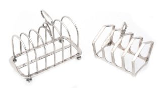 A Victorian silver six division toast rack by Edward Gilbert, London 1883  A Victorian silver six