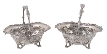 A pair of German silver coloured oval baskets, maker`s mark W, post 1886  A pair of German silver