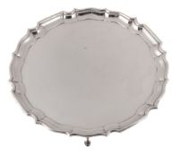 A silver shaped circular salver, maker`s mark DLtd , Sheffield, 1940  A silver shaped circular