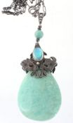 An amazonite pendant, the polished pear shaped amazonite drop below a...  An amazonite pendant,
