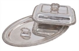 An electro-plated oblong entree dish, cover and handle, with gadrooned borders  An electro-plated
