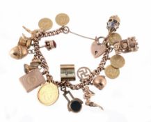 A charm bracelet, the curb link bracelet suspending a variety of charms...  A charm bracelet,