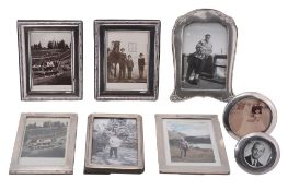 A collection of silver mounted photo frames, to include  A collection of silver mounted photo