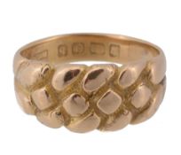 An 18 carat gold keeper ring, Birmingham, 1901, finger size P 1/2, 7.4g  An 18 carat gold keeper