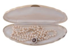 A three row cultured pearl necklace, composed of uniform cultured pearls  A three row cultured pearl