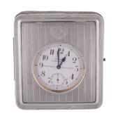 Finnigan`s Ltd, Deansgate, Manchester, a silver mounted travelling clock...  Finnigan`s Ltd,