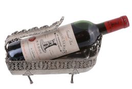 An Italian silver coloured wine bottle holder by Enrico & Alberto Messulam  An Italian silver