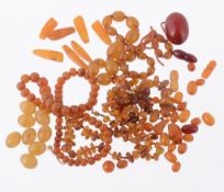 A selection of amber and amber coloured beads  A selection of amber and amber coloured beads,