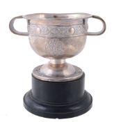 An Irish silver twin handled small trophy cup by Alwright & Marshall Ltd  An Irish silver twin
