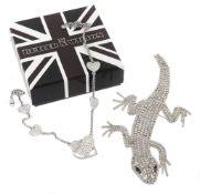 A lizard brooch by Butler and Wilson, of articulated design, stamped B & W  A lizard brooch by
