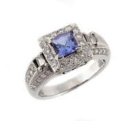A tanzanite and diamond ring, the central square shaped tanzanite within a...  A tanzanite and