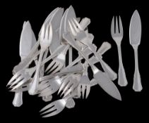 A set of twelve French silver coloured hour glass pattern fish knives and forks  A set of twelve
