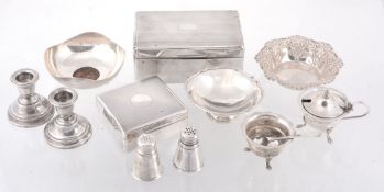 A group of silver, including: a sweet dish inset with a copper cartwheel...  A group of silver,