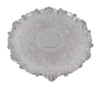 A Victorian silver shaped circular small salver by William Ker Reid  A Victorian silver shaped