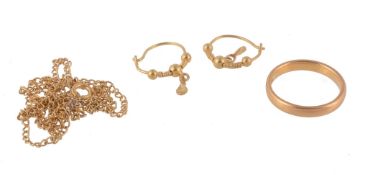 A 22 carat gold band ring, finger size I 1/2; a pair of Indian earhoops; and... A 22 carat gold band