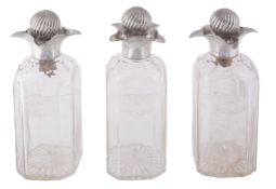 A set of three Victorian silver mounted glass decanters, maker`s mark JB  A set of three Victorian
