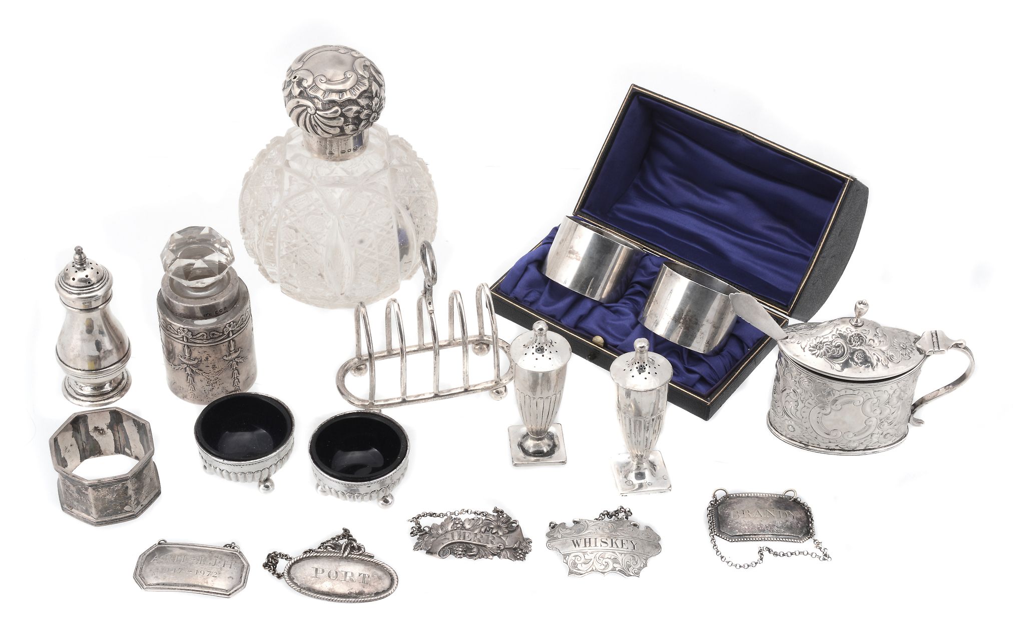 A mixed silver lot, comprising; a boxed pair of plain circular napkin rings...  A mixed silver lot,