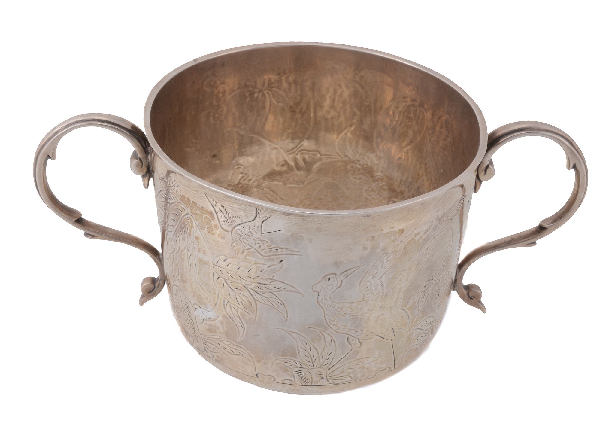 A silver gilt porringer by The Goldsmiths & Silversmiths Co  A silver gilt porringer by The