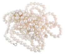 Two freshwater cultured pearl necklaces; the first with mainly ovoid beads  Two freshwater