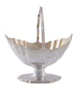A George III silver shaped oval sugar basket by Henry Chawner, London 1788  A George III silver