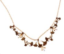 A French Art Nouveau lily of the valley necklace  A French Art Nouveau lily of the valley necklace,