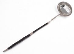 A George III silver toddy ladle by Thomas Morley, London 1785  A George III silver toddy ladle by