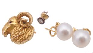 A brooch, in the form of a ram; a pair of cultured pearl earrings  A brooch,   in the form of a ram;