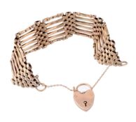 A gatelink bracelet, the polished and textured panels to a heart shaped...  A gatelink bracelet,