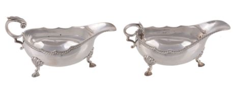 A pair of silver oval sauce boats by Hampton Utilities, Birmingham 1974  A pair of silver oval sauce