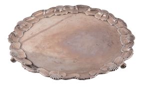 A silver shaped circular salver by Mappin & Webb, Sheffield 1908  A silver shaped circular salver by