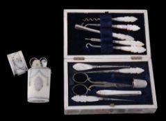 A mother of pearl manicure set and a late 18th century silver mounted ivory...  A mother of pearl