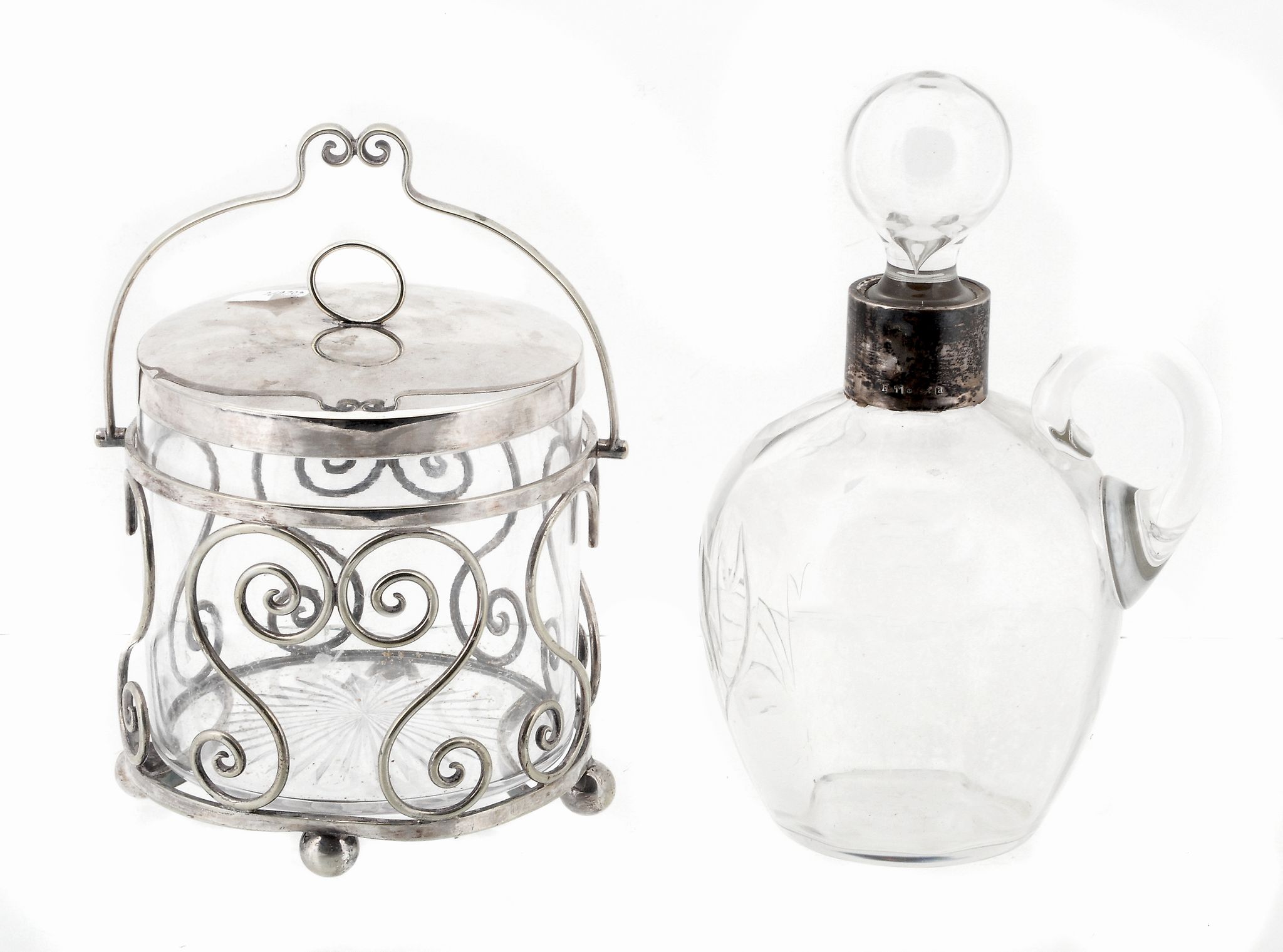 A late Victorian glass whisky jug and stopper with a silver collar by...  A late Victorian glass