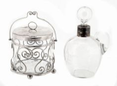 A late Victorian glass whisky jug and stopper with a silver collar by...  A late Victorian glass