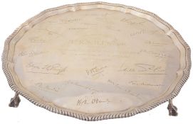 A silver shaped circular salver by The Goldsmiths & Silversmiths Co  A silver shaped circular salver