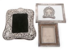 Four photograph frames, comprising a shaped rectangular by Dominick & Haff  Four photograph frames,