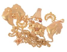 A gold coloured flower head pendant and ear pendants; together with a pair...  A gold coloured