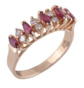 A ruby and diamond ring, the marquise cut rubies interspaced with pairs of...  A ruby and diamond