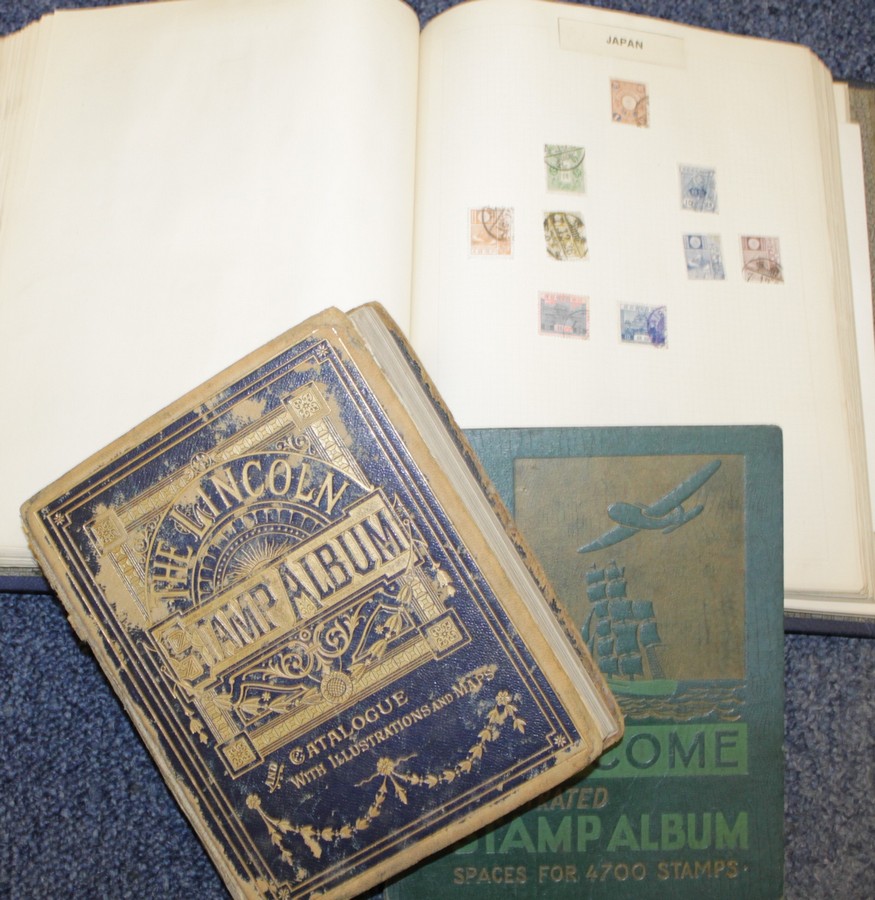 Stamps - Two partially filled albums of world stamps; and a smaller album, (3).