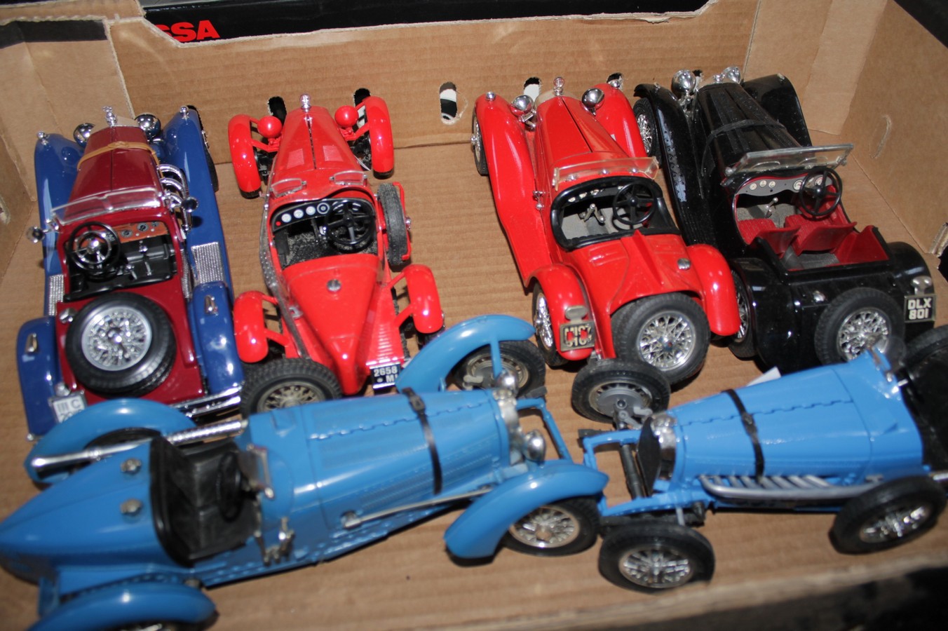 Six Burago 1:18 scale diecast model cars, comprising: two Alfa Romeo, two Bugatti, a Mercedes, and a