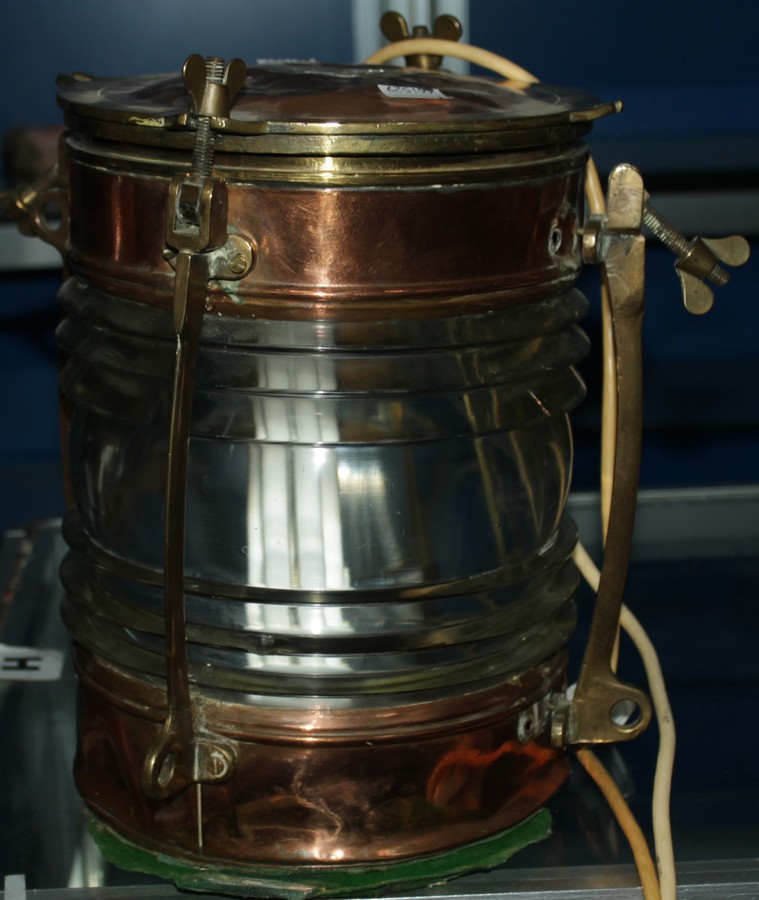 * A copper and brass ship`s lantern, made by Telford Grier Mackay & Co. Glasgow, numbered `8350`,