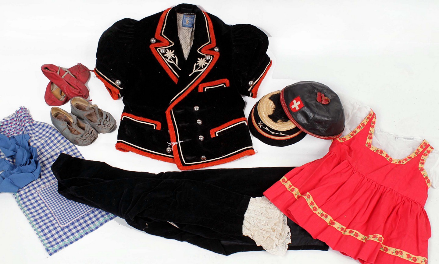 A child`s velvet `Tyrolean` costume, circa 1930s; together with a traditional Austrian black