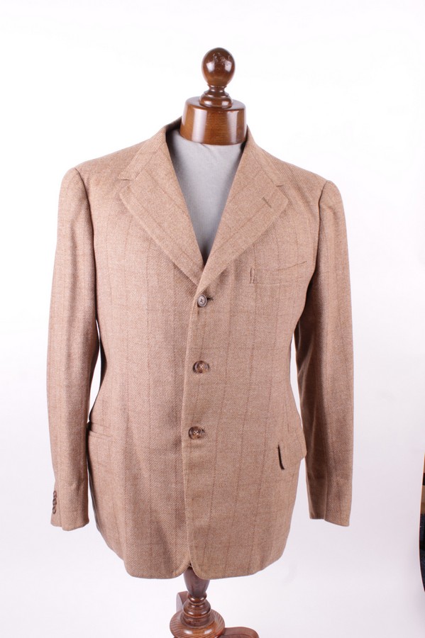 A vintage tweed shooting suit; together with a green tweed jacket by Fine of Scotland; two pairs