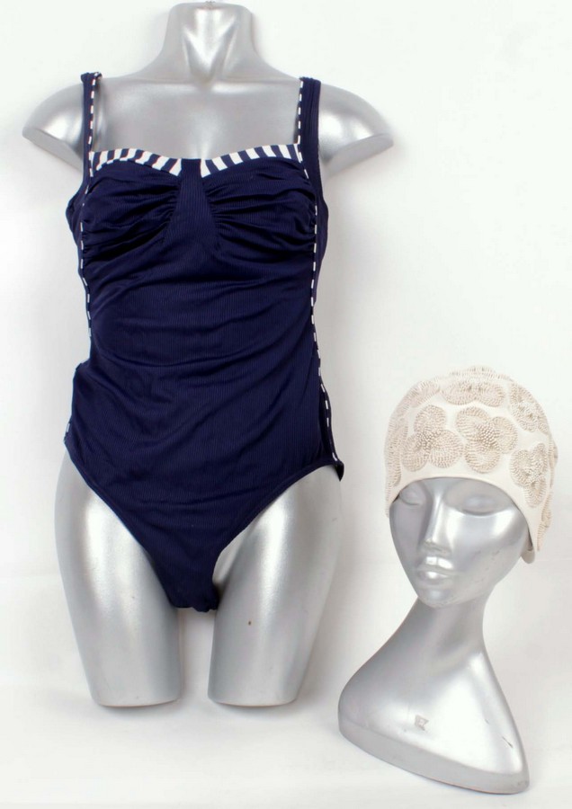 A quantity of ladies vintage swimwear and swim hats, including: a blue and black swimming costume by