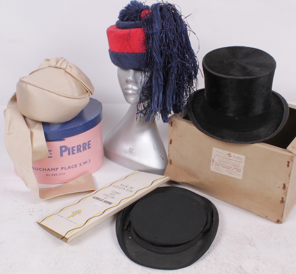 A Gieves of London black silk top hat; together with an opera hat in its original Andre & Co. box; a