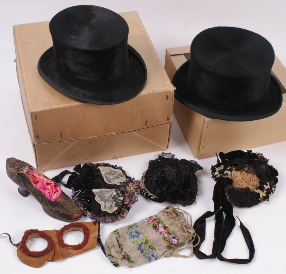 A Tom Janout canvas driving hat; together with a pair of early 20th century driving goggles; two