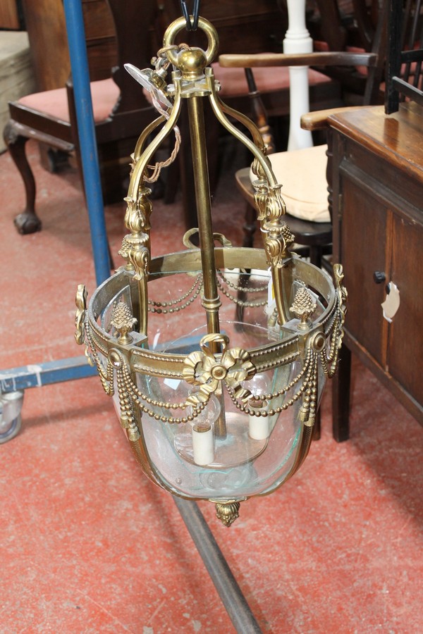 A Georgian style brass, glass lantern 75cm high