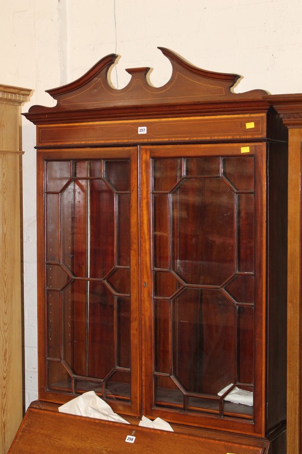 An Edwardian mahogany bureau bookcase with glazed upper section 220cm high